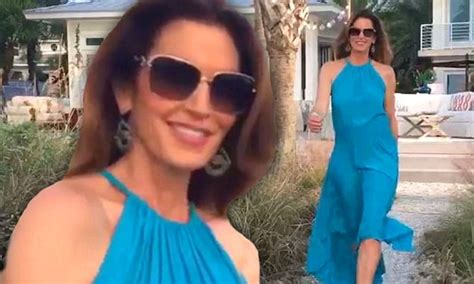 Cindy Crawford Wears Cerulean Blue Gown While Shooting Commercial In Florida Daily Mail Online