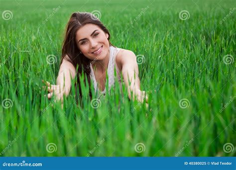 Young Woman Relaxing And Smiling In Fresh Green Fi Stock Image Image