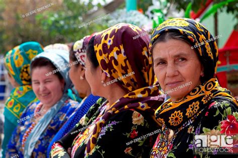 A Row Of Older Women In Traditional Dress And Scarf Ashgabat