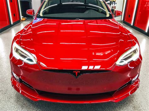A tesla model s finished with what appears to be a deep crimson shade. Tudor's Multi-Coat Red Tesla Model S P100D - Unplugged ...