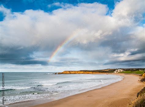 Rainbow Over Torquay Back Beach With Torquay Surf Lifesaving Club And