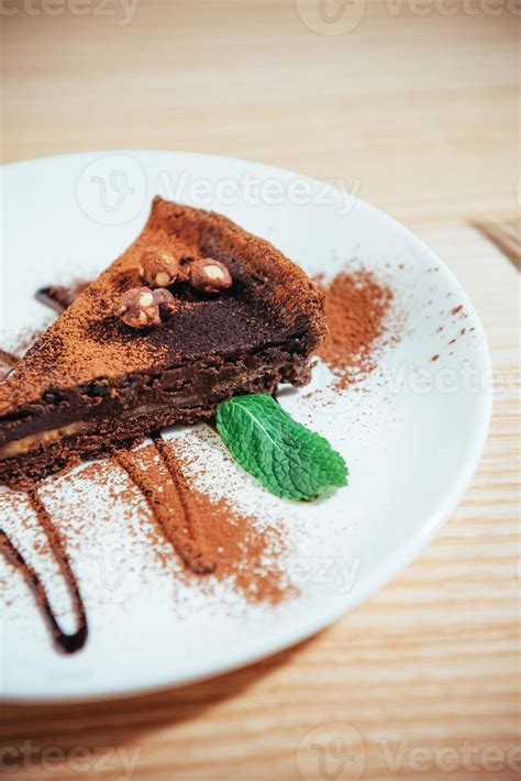 Delicious Chocolate Cake With Hazelnuts Stock Photo At Vecteezy