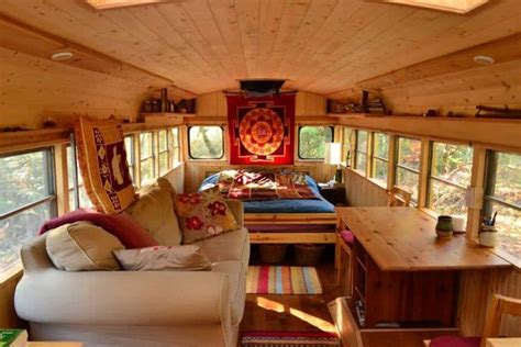 This shuttle bus rv conversion has an oven cooker, sink, and various chopping surfaces. 24 Best Short Bus Camper Conversion Ideas | Camperism