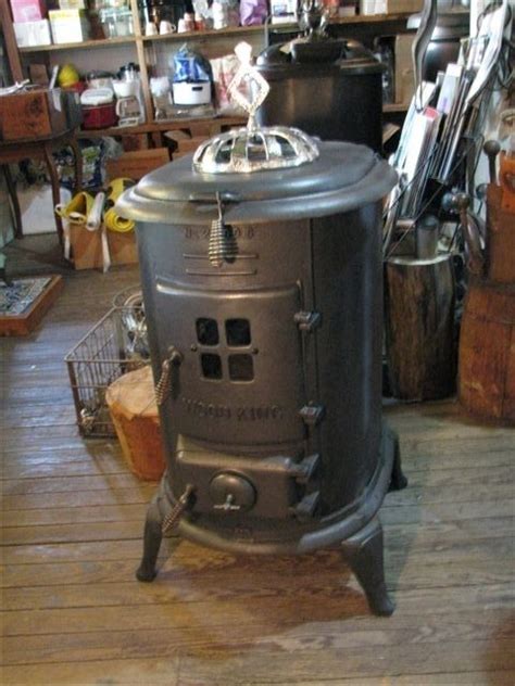 Read full reviews on popular wood burning stoves for your tiny house! Antique "Wood King" woodburning stove. Minimalist while ...