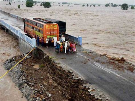 Gujarat Floods Pm Announces Rs 500 Crore Aid Ahmedabad Airport Runway