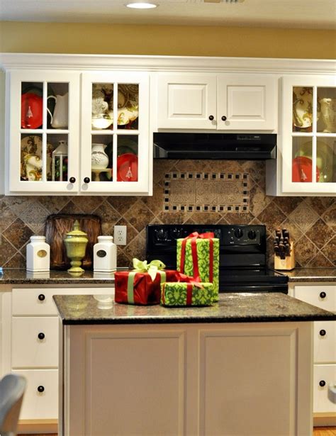 Just fill the empty space on top of the cabinets with some wood, add some trim to create the illusion of cabinets, paint the space, and add hardware. 40 Cozy Christmas Kitchen Décor Ideas | DigsDigs