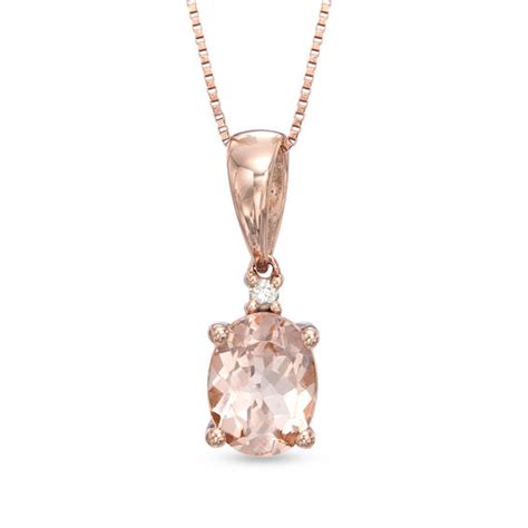 18k yellow gold open work setting with an oval morganite center stone with round accent diamonds in. Oval Morganite and Diamond Accent Pendant in 10K Rose Gold ...