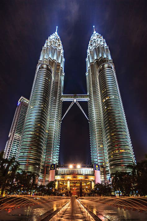 The Petronas Towers Also Known As The Petronas Twin Towers Are Twin