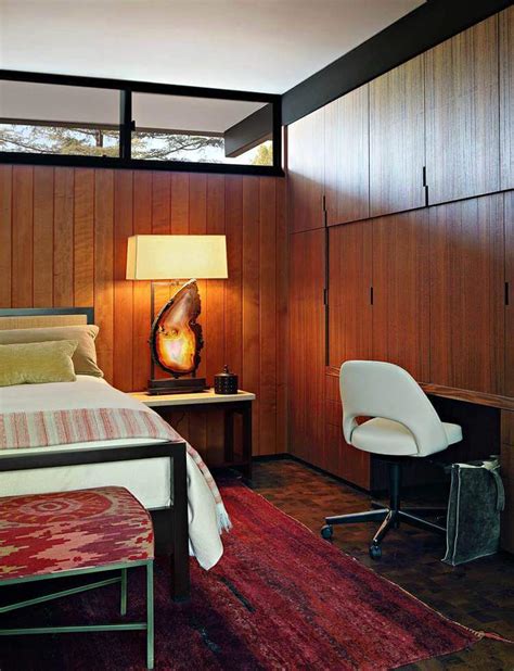 Modern master bedroom wooden strip feature wall in natural light coloured wood in matt finish. Contemporary La Canada Mid-Century Project By Jamie Bush & Co.