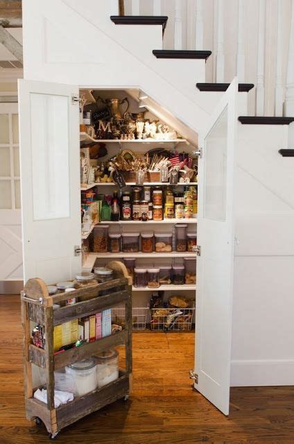Seen on hgtv, using mason jars and the space under the upper kitchen. Kitchen Pantry Under the Stairs (Content in a Cottage) | For the Home | Under stairs pantry ...