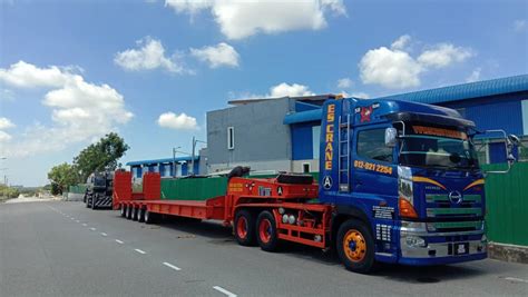 We do every means to satisfy our customers. Low Loader Rental | ES Crane Trading Sdn Bhd | Malaysia