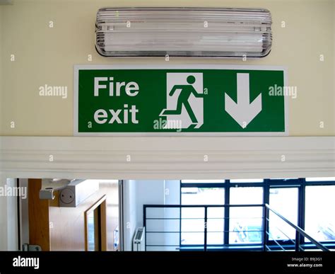 Emergency Light And Fire Exit Sign Over Door Stock Photo Alamy