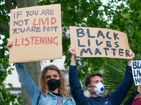 Protesters Holding Signs At Black Lives Matter Protest Demonstration In