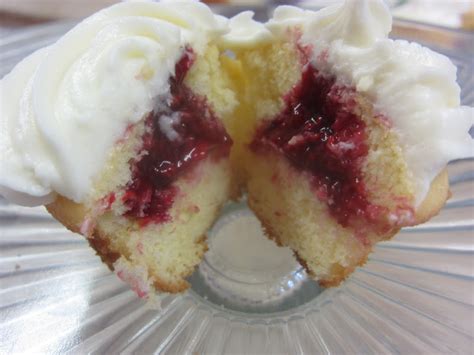 When finished baking, the filling will be in the middle. ABQ Recipe Club: Raspberry filled Vanilla Cupcakes with ...
