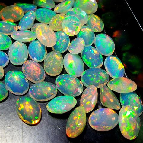 1 Pieces 7x9mm Ethiopian Opal Faceted Oval Loose Gemstone Etsy