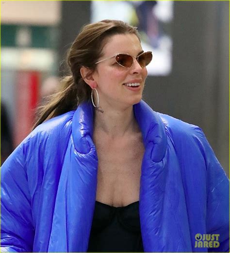 Julia Fox Wears A Yeezy X Gap Jacket While Arriving For Milan Fashion