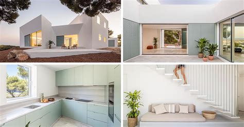 The Modern White Minimalist Exterior Of This Home Is Softened By The