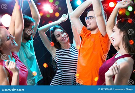 Group Of Young People Having Fun Dancing At Party Stock Photo Image