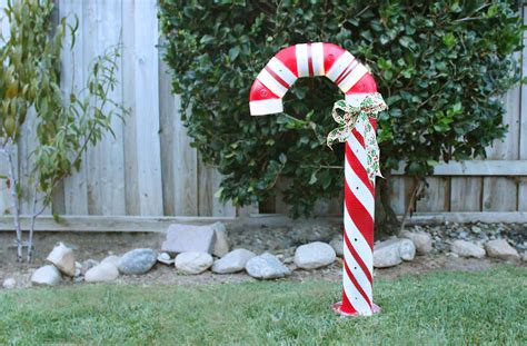 Making holiday decorations with peppermint candy : How to Make a Lighted PVC Candy Cane Decoration | Candy cane decorations, Outdoor christmas ...