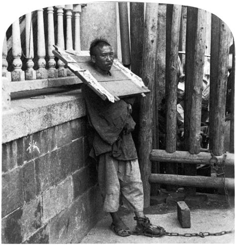 China Punishment C1900 Na Criminal In China Chained By The Ankle To A