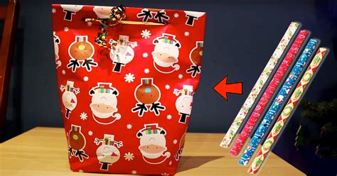 Use fabric to wrap up a gift and tie it in a bow. How To Make A Gift Bag Using Wrapping Paper