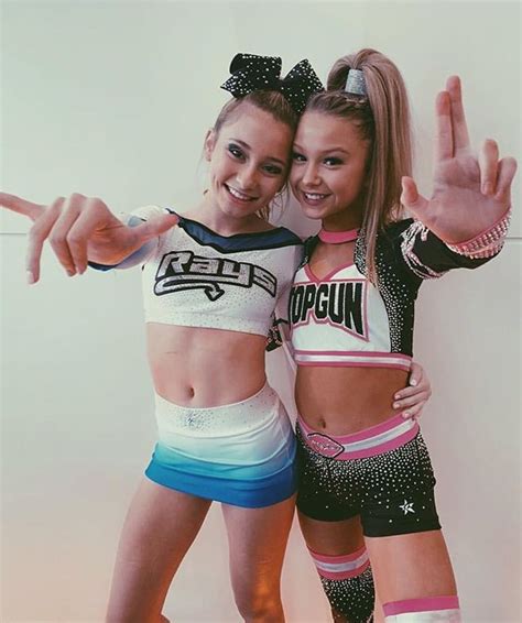 Pin By Melanie On Cheer Cheer Poses Cheer Outfits Cheerleading Outfits