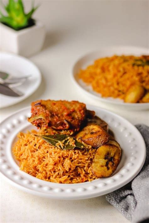 Nigerian Smoky Jollof Rice Served With Peppered Turkey And Fried Plantain Curry Recipes Rice
