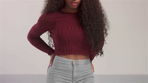 Beauty Black Mixed Race African American Woman With Long Curly Hair And Perfect Smile Looking At