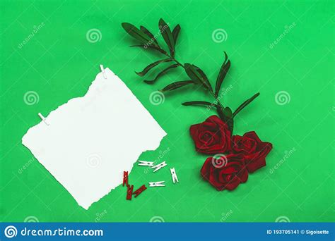 Mockup Invitation Blank Greeting Card And Red Roses Flowers And Clothespin Flat Lay Top View