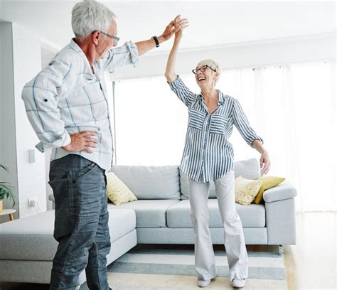 Premium Photo Dancing Senior Woman Home Love Couple Happy Man