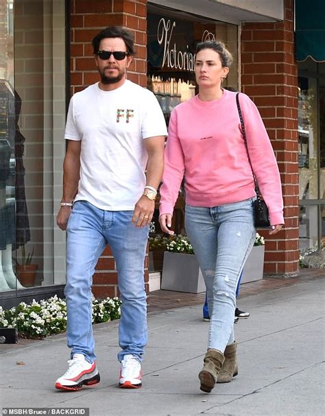 mark wahlberg and wife rhea durham keep it casual in stonewash jeans for a