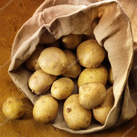 Overflowing Bag Of Potatoes Stock Photo By ©vanvonno 3397958