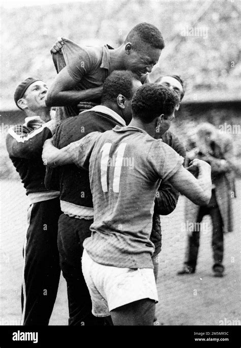 pele top of brazil celebrates with teammates after brazil won the 1958 fifa world cup final