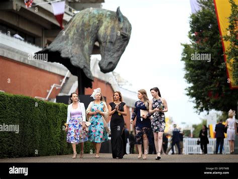 Female Racegoers Arrive For Day Two Of The Qatar Goodwood Festival