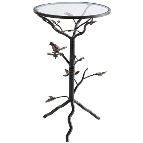 The milla table displays strong steel molded in one continuous line and set at ninety degree angles to create a versatile, contemporary accent piece that. Perched Bird Accent Table | Bronze accent table, Accent ...