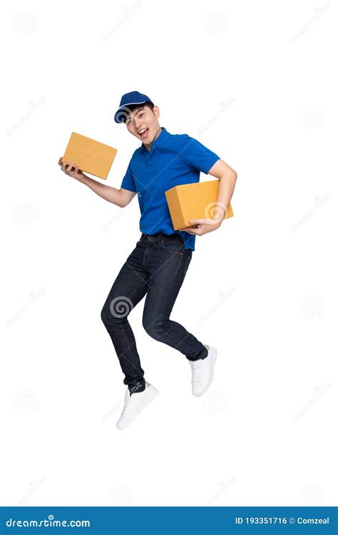 Asian Delivery Man Jumping And Holding Parcel Box Isolated On White