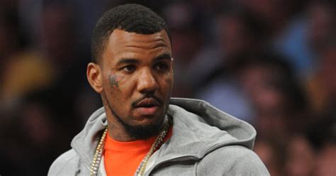 rapper the game pleads not guilty to punching off duty officer during basketball game cbs