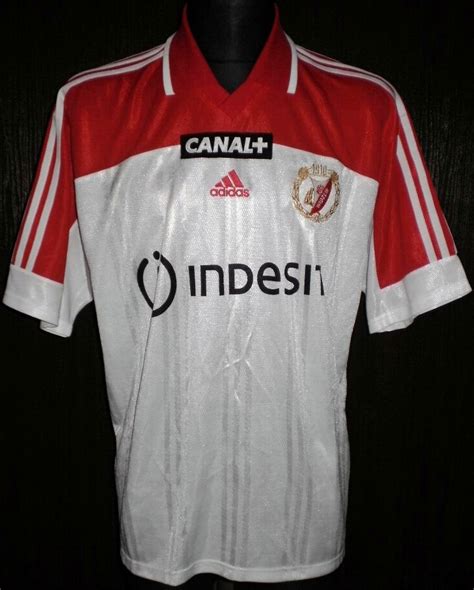 Widzew made a dream debut in european cups. Widzew Lodz Away football shirt 2002 - 2003. Added on 2013 ...