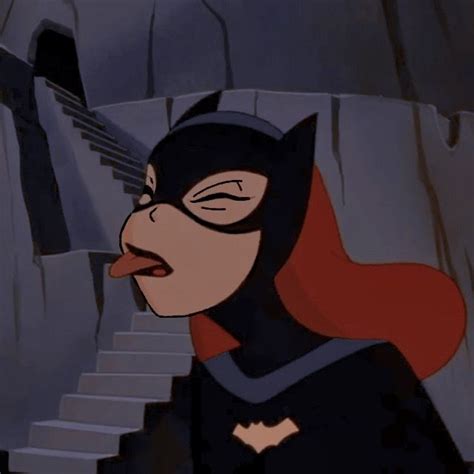 An Animated Catwoman With Her Mouth Open And Tongue Out Standing In