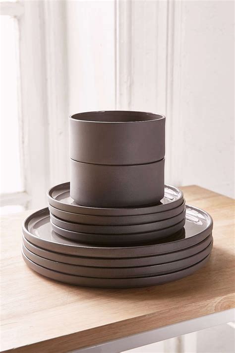 The plates and bowls have a speckled ceramic surface with a more raw, colored clay bottom. 12-Piece Modern Dinnerware Set | Modern dinnerware ...