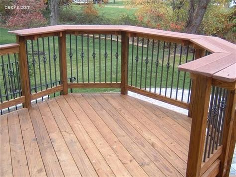 This railing is, once again, more functional than pretty. Deck rail design incorporates a bar top with a wide ledge ...