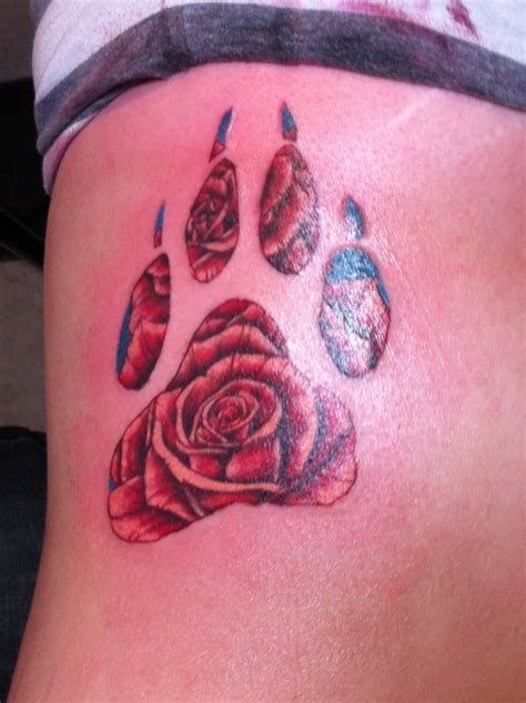 White ink heart in paw print tattoo on wrist. Wolf print, rose tattoo | Tattoos :)) | Pinterest | Rose ...