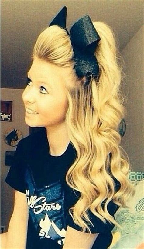 The pigtail hairstyle looks really cute. Best 25+ Cheer hair ideas on Pinterest | Cheerleading hair ...
