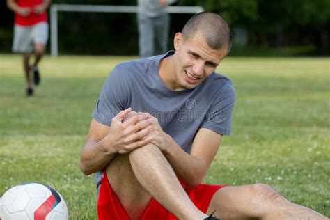Knee Injury During Football Practice Stock Photo Image Of Suffer