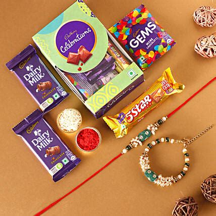 Buy Send Sneh Pearl Bhaiya Bhabhi Rakhi Set N Cadbury Celebrations