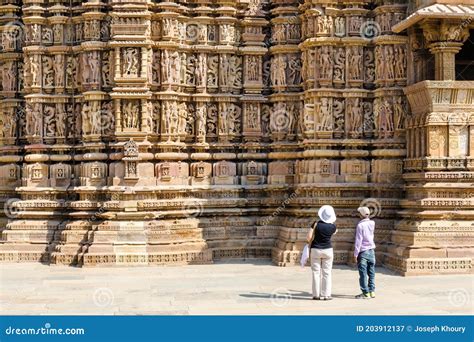 Tourist Visiting Khajuraho Hindu Temples With A Guide Khajuraho India
