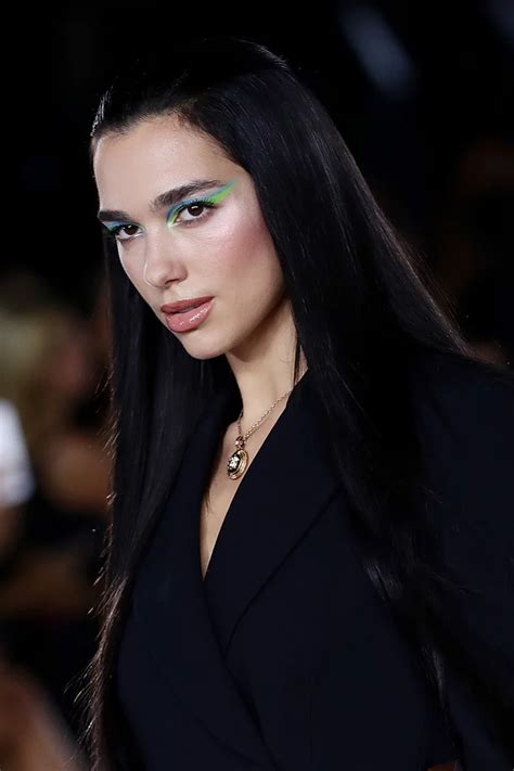 Dua Lipa S Sexy Catsuit Is Reminiscent Of Another Plunging Versace Look