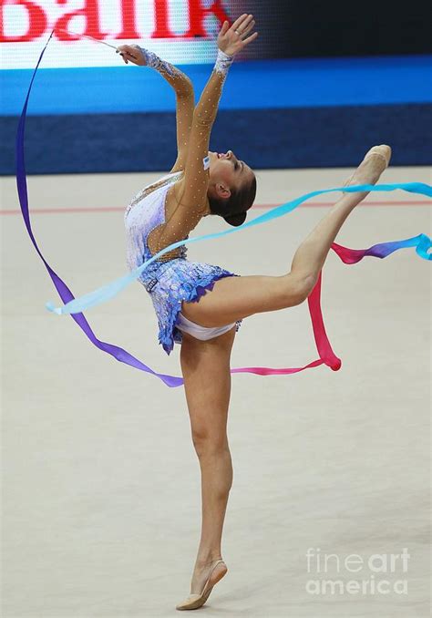 Rhythmic Gymnast Performing With Ribbon Photograph By Ria Novosti