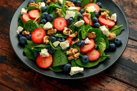 Spinach Strawberry Blueberry Salad With Walnut And Feta Cheese