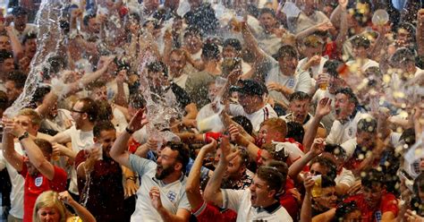 England World Cup Fans Throw Beer Into The Air As Wild Goal
